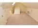 Cozy carpeted bedroom with a dormer window and built-in cabinets, providing ample storage space at 2708 Coleberry Trl, Rocky Mount, NC 27804