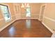 Formal dining room with hardwood floors and a built-in cabinet at 2708 Coleberry Trl, Rocky Mount, NC 27804