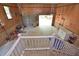 Spacious garage featuring wooden wall paneling and ample storage at 2708 Coleberry Trl, Rocky Mount, NC 27804
