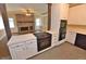 Spacious kitchen featuring modern appliances, tile flooring, and view to the cozy living room at 2708 Coleberry Trl, Rocky Mount, NC 27804
