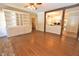Living room showing open floor plan to kitchen with updated appliances and view of staircase to second level at 2708 Coleberry Trl, Rocky Mount, NC 27804