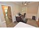 Cozy office space featuring a desk and chair, bathed in natural light at 2708 Coleberry Trl, Rocky Mount, NC 27804