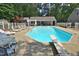 In-ground pool featuring a diving board and lounge chairs for outdoor entertainment and relaxation at 2708 Coleberry Trl, Rocky Mount, NC 27804