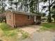 The brick house is a cozy place to relax and unwind at 2915 Ross Rd, Durham, NC 27703