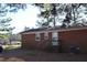 The brick house is a cozy place to relax and unwind at 2915 Ross Rd, Durham, NC 27703