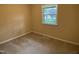 Neutral bedroom with wall to wall carpeting, with one window at 2915 Ross Rd, Durham, NC 27703