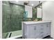 Bathroom showcasing a walk-in shower, dual vanity, and modern fixtures at 301 Lord Berkley Rd, Raleigh, NC 27610