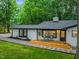 Exterior view of a charming home showcasing the architecture and manicured landscaping at 301 Lord Berkley Rd, Raleigh, NC 27610