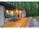 Inviting front porch with stylish seating, providing a welcoming entrance to the home at 301 Lord Berkley Rd, Raleigh, NC 27610