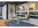 Cozy front porch featuring stylish seating and a view of the well-maintained landscape at 301 Lord Berkley Rd, Raleigh, NC 27610