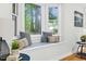 Charming window seat nook with decorative pillows, a tiled base, and a view of the outdoors at 301 Lord Berkley Rd, Raleigh, NC 27610