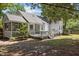 Enjoy outdoor living with this back deck, screened porch and a grill at 304 Indigo Pl, Garner, NC 27529