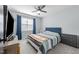 Calm bedroom featuring a ceiling fan, closet, and neutral carpeting at 304 Indigo Pl, Garner, NC 27529