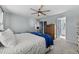 Spacious bedroom with a ceiling fan, carpeting, and ensuite bath at 304 Indigo Pl, Garner, NC 27529