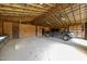 Spacious barn featuring an open interior, concrete floors, and exposed wooden framework with a pick-up truck inside at 3044 Rock Springs Church Rd, Creedmoor, NC 27522