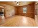 Cozy bedroom featuring hardwood floors and a ceiling fan at 3044 Rock Springs Church Rd, Creedmoor, NC 27522