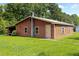 View of the exterior, showcasing the exterior design and landscaping at 3044 Rock Springs Church Rd, Creedmoor, NC 27522