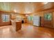 Open kitchen featuring wooden cabinets and ample countertop space at 3044 Rock Springs Church Rd, Creedmoor, NC 27522