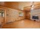 Living room featuring wood flooring, a fireplace and natural light from windows at 3044 Rock Springs Church Rd, Creedmoor, NC 27522