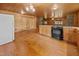 Living area with an oven range and open layout to the kitchen at 3044 Rock Springs Church Rd, Creedmoor, NC 27522