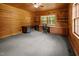 Office space with built-in shelves and cabinets, ideal for work at 3044 Rock Springs Church Rd, Creedmoor, NC 27522