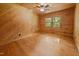 Inviting room with wood-paneled walls and natural light from windows at 3044 Rock Springs Church Rd, Creedmoor, NC 27522