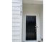 A close up exterior view of the front door with the house numbers 3105 to the left at 3105 White Blossom Ct, Raleigh, NC 27610