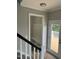 Hallway featuring coat rack with bench and door to deck at 3204 Overlook Ct, Burlington, NC 27215