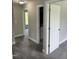 Hallway with carpeted floor and doors at 3204 Overlook Ct, Burlington, NC 27215