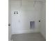 Laundry room with tile floor and hookups for washer and dryer at 3204 Overlook Ct, Burlington, NC 27215
