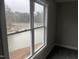 Window view overlooking the lake and wooded property at 3204 Overlook Ct, Burlington, NC 27215