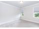 Spacious bedroom with neutral walls and carpet, featuring large windows and ample natural light at 4104 Green Chase Way, Apex, NC 27539