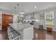 Spacious kitchen features a large island, stainless steel appliances, and ample counter space at 416 Fred Tew Rd, Dunn, NC 28334