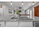 Close-up of the kitchen island featuring granite countertops and a stainless steel sink at 416 Fred Tew Rd, Dunn, NC 28334