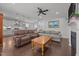 Cozy living room with hardwood floors, comfortable seating, and an open floor plan to the kitchen at 416 Fred Tew Rd, Dunn, NC 28334