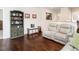 Comfortable living space showcasing hardwood floors, stylish decor, and an open layout perfect for relaxation and entertainment at 4179 Dunkirk Dr, Burlington, NC 27215