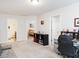 Bright office space with a comfortable sitting area in an open and accessible floorplan at 4179 Dunkirk Dr, Burlington, NC 27215