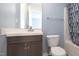 Well-lit bathroom with a vanity and a shower-tub combination at 418 Lodestone Dr, Durham, NC 27703