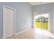 Bright dining area with tile flooring, a chandelier, and sliding glass doors leading to the yard at 418 Lodestone Dr, Durham, NC 27703
