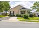 Charming single-story home featuring a welcoming front porch and well-manicured landscaping at 418 Lodestone Dr, Durham, NC 27703