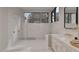 Modern bathroom features large shower with bench, soaking tub, and dual sink vanity at 429 Shinleaf Pond Trl, Raleigh, NC 27614