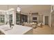 Bright living space featuring fireplace, built-ins, and open design that flows into the gourmet kitchen at 429 Shinleaf Pond Trl, Raleigh, NC 27614