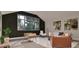 Entertainment area with foosball table, modern lighting, and comfortable furniture at 429 Shinleaf Pond Trl, Raleigh, NC 27614