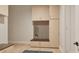 Organized mudroom with built-in storage cabinets, bench seating, and a coat rack for convenience at 429 Shinleaf Pond Trl, Raleigh, NC 27614