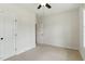 Bedroom featuring carpet, ceiling fan, and closet at 45 Glen Bend Ct, Spring Lake, NC 28390
