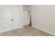 Bedroom featuring carpet, ceiling fan, and closet at 45 Glen Bend Ct, Spring Lake, NC 28390