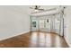 Bright primary bedroom with a tray ceiling, hardwood floors, and lots of natural light at 45 Glen Bend Ct, Spring Lake, NC 28390