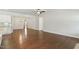 Open living room with hardwood floors and view to formal dining room at 45 Glen Bend Ct, Spring Lake, NC 28390