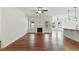 Open living room with fireplace, ceiling fan and hardwood floors at 45 Glen Bend Ct, Spring Lake, NC 28390