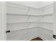 Walk-in pantry with white wire shelving for storage and organization at 45 Glen Bend Ct, Spring Lake, NC 28390